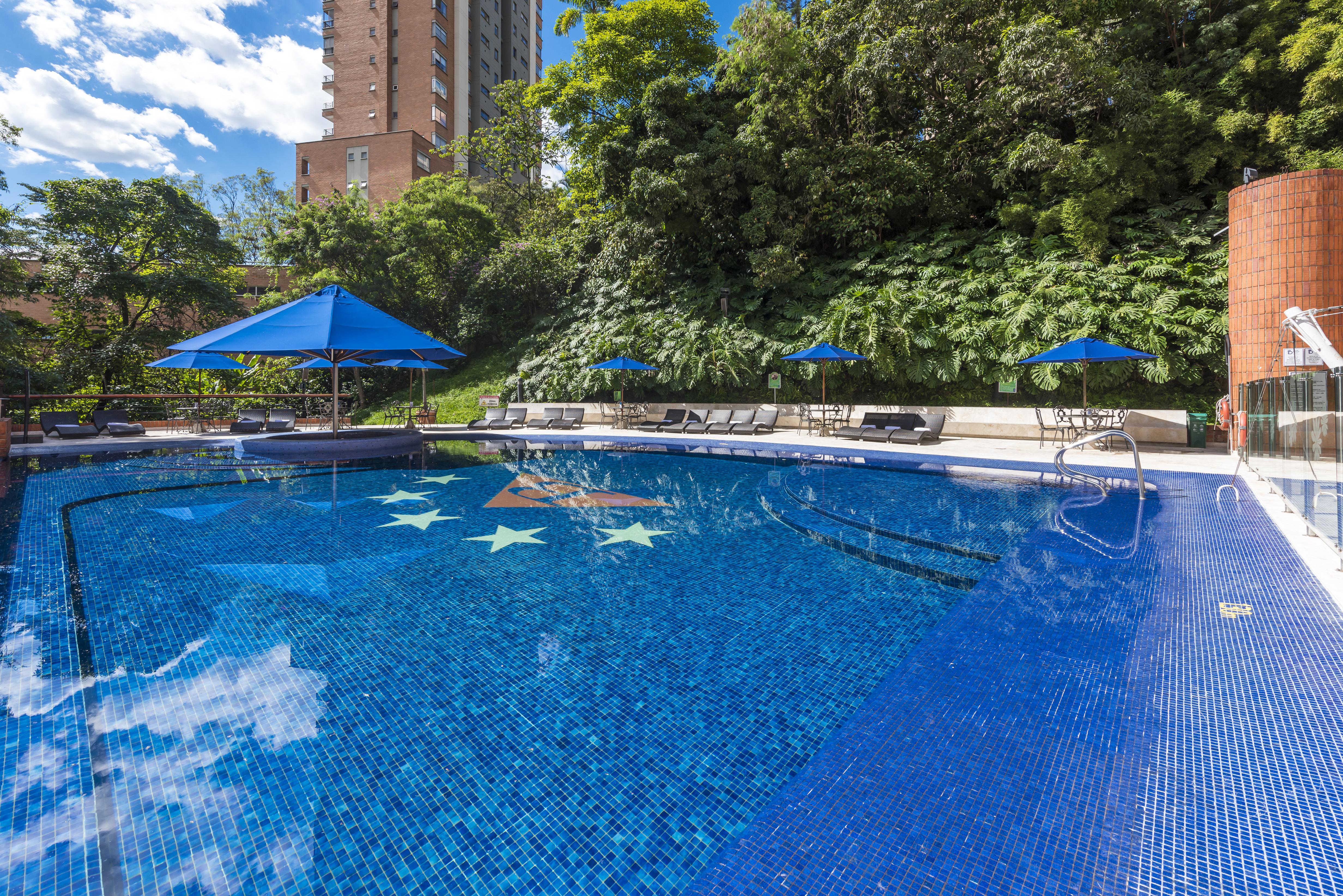 Hotel Dann Carlton Belfort Medellín Esterno foto Swimming pool