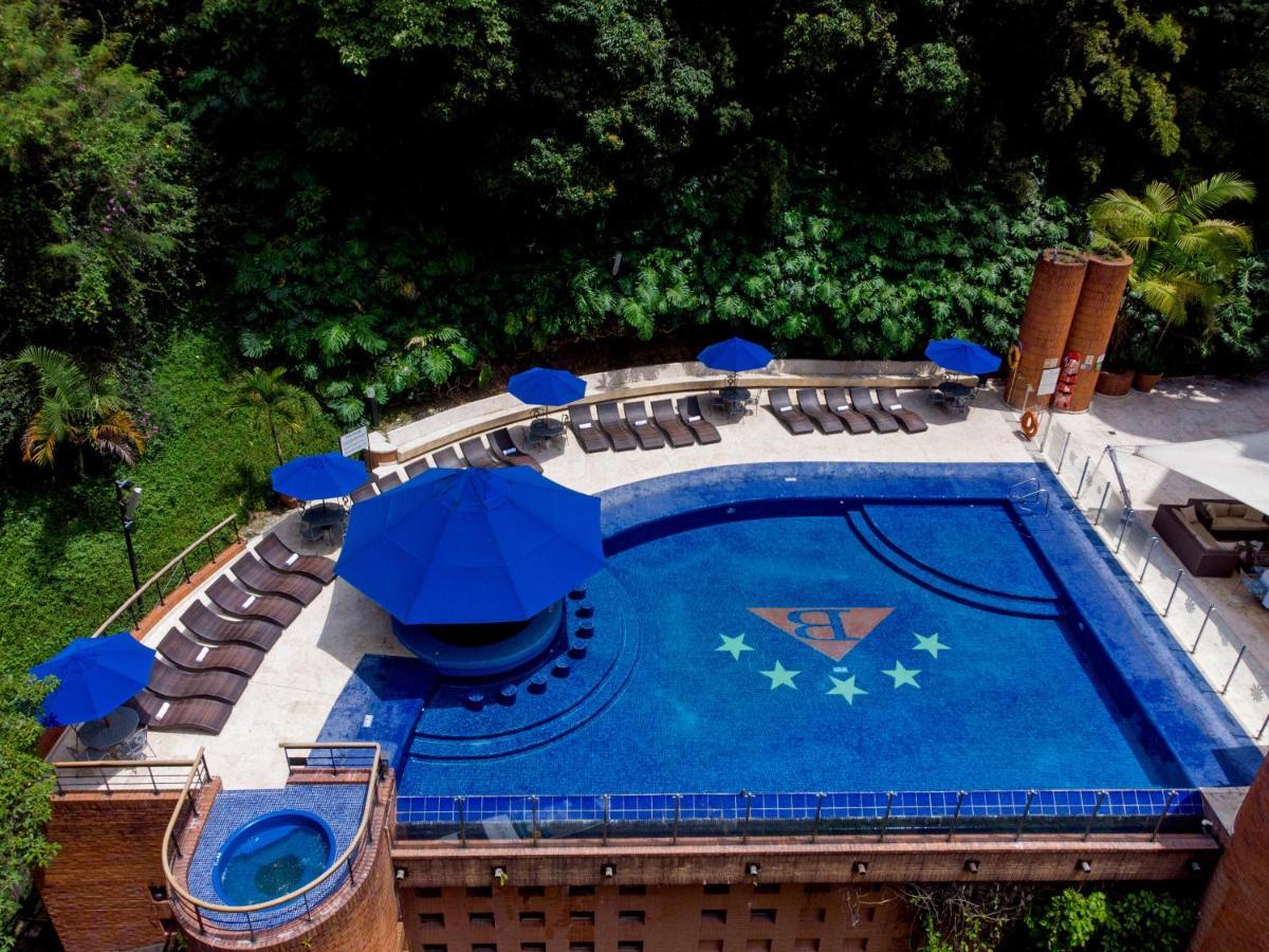 Hotel Dann Carlton Belfort Medellín Esterno foto The swimming pool at the hotel