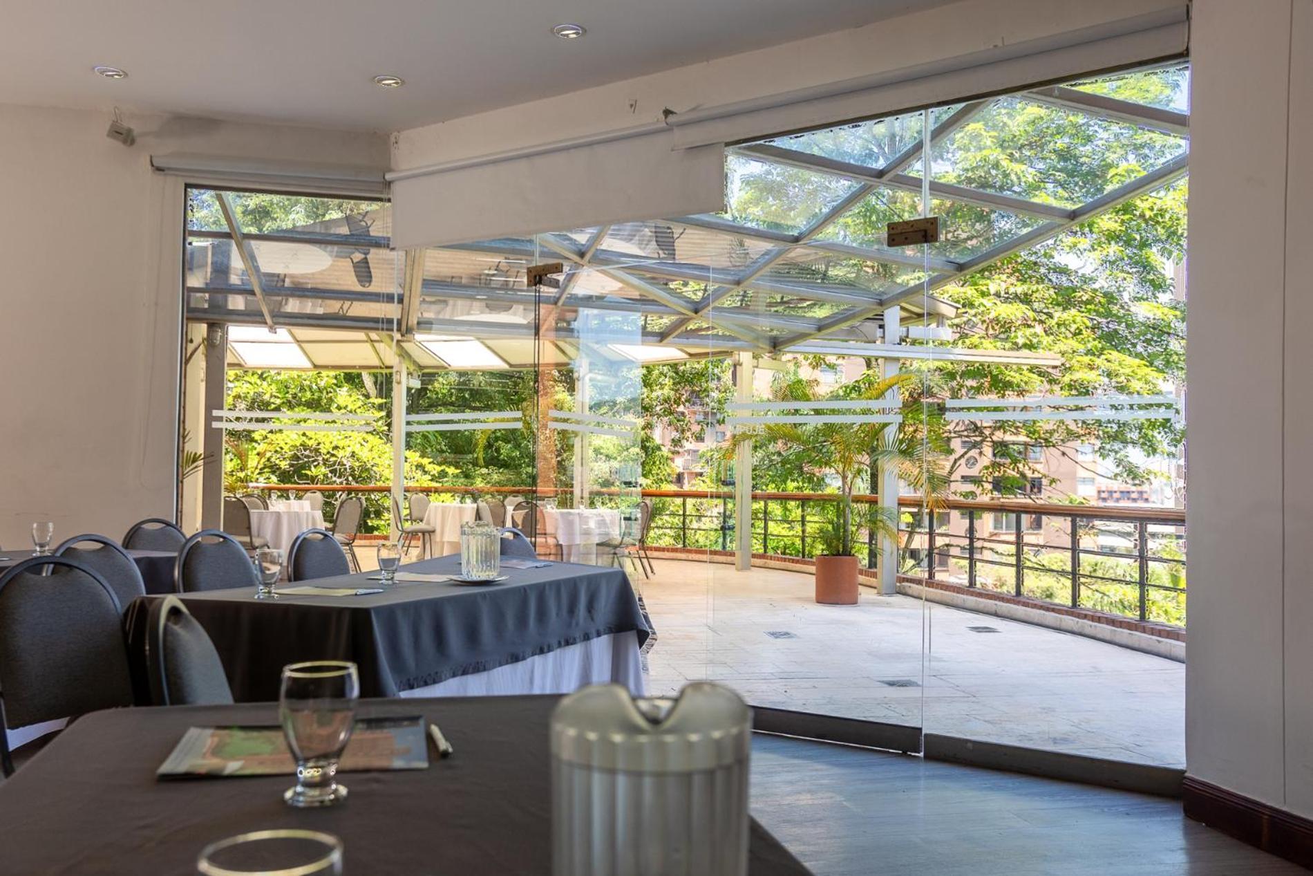 Hotel Dann Carlton Belfort Medellín Esterno foto The restaurant