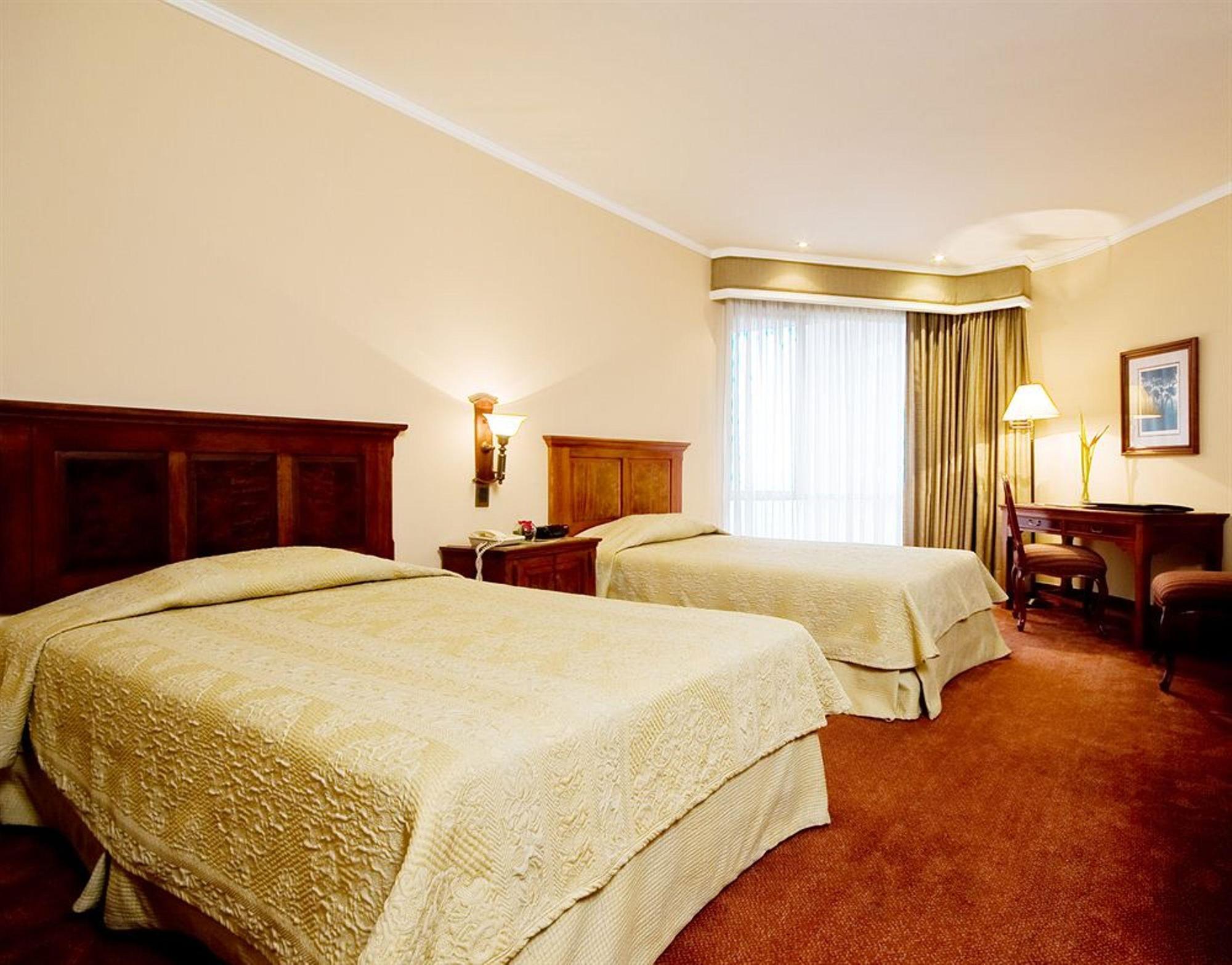 Hotel Dann Carlton Belfort Medellín Esterno foto A room at the hotel